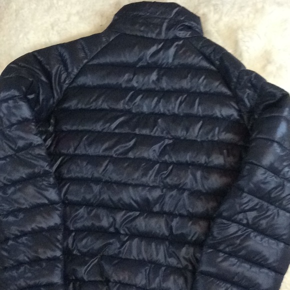 hole in puffer jacket